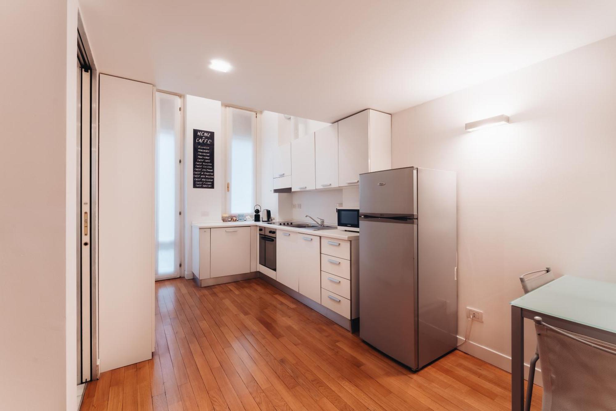 Charming De Togni Apartment Milan Bagian luar foto